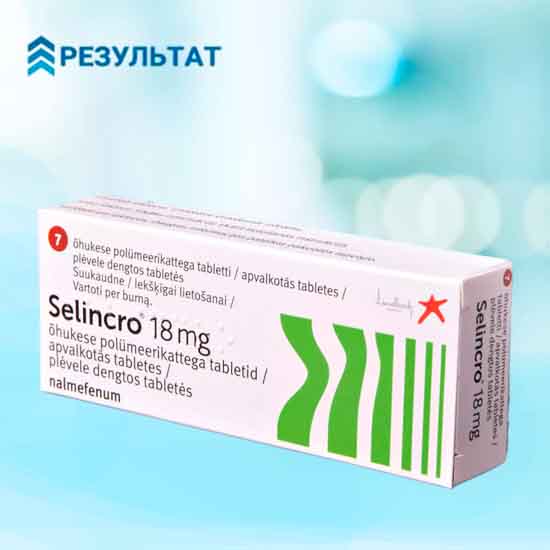 Коробка с таблетками на размытом фоне